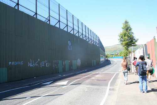 A peace wall at Cupar Way in West Belfast, separating the Catholic Falls Road from the Protestant Shankill Road.