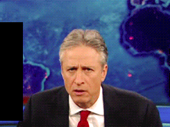 Gif of a news caster looking skeptical and a little shocked