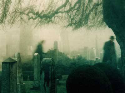 Ghosts haunting a graveyard
