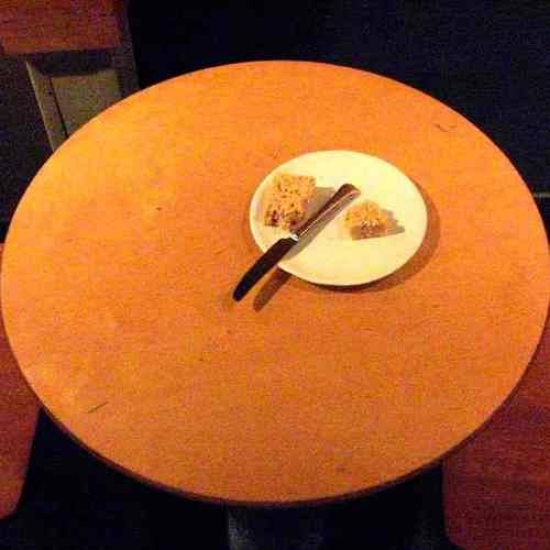 Starbucks table with half-eaten Starbucks treat (c) David Ocker