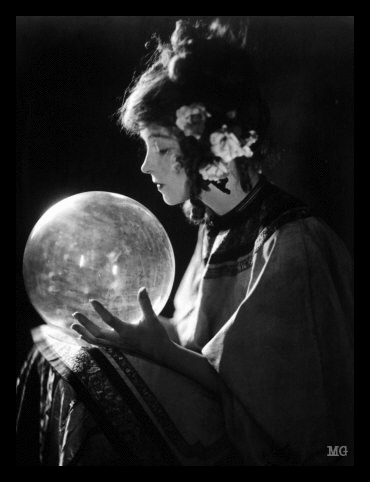 blackoutraven:    Lillian Gish, Early 1920s    What does the crystal ball reveal?  Shana is too afraid to see the future.  In her heart, she knows that evil  walks the street of Oasis.  Her cards show her death in an unnatural form.  But what does the future hold for the innocent  residents and tourists?  THE DEAD GAME BY SUSANNE LEIST  http://www.amazon.com/author/susanneleist