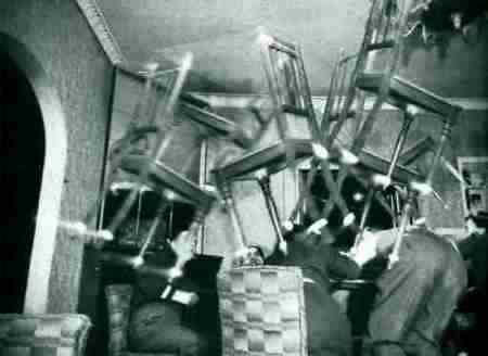 Poltergeist activity throwing chairs across room