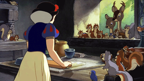 Snow White rolling dough in front of animals