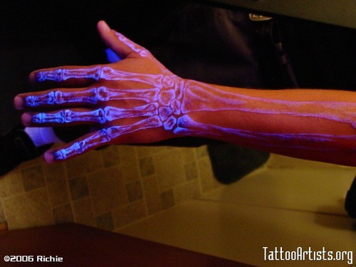 Blacklight tattoos. I found this online, and these are friggin SICK.