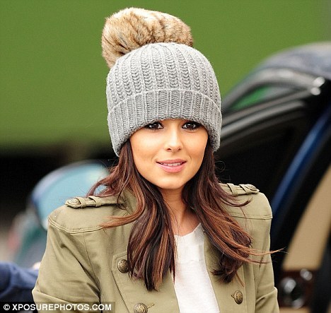 Anyway on that depressing note have a picture of Cheryl Cole's lovely hat
