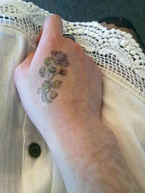 Hm, for my next (real) tattoo, i've been thinking of flower, ouroboros or a 
