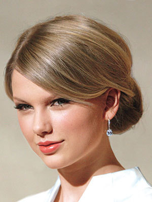 low side bun hairstyles. hair into a low ponytail.