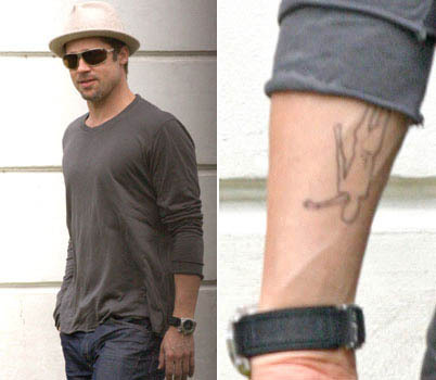 Brad Pitt's forearm. Forearm with tattoos.