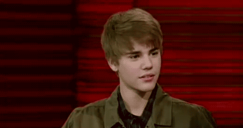 justin bieber smiling gif. Justin flashes you his