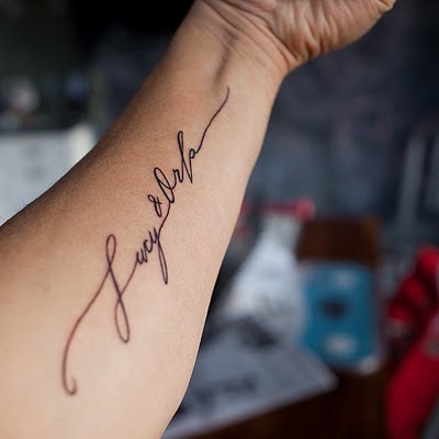 writing tattoos for girls on ribs. writing tattoos for girls on ribs. Tattoo Showing Wording Written tattoo 