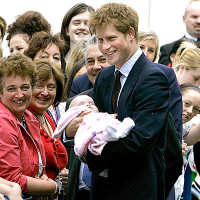 prince harry baby. prince harry holding a aby: