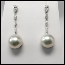 18kt White Gold Diamond and South Sea Cultured Pearl earrings.