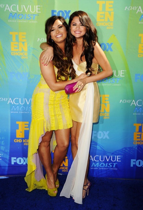 Demi Lovato and Selena Gomez are joined to the hip at this years 2011 Teen 