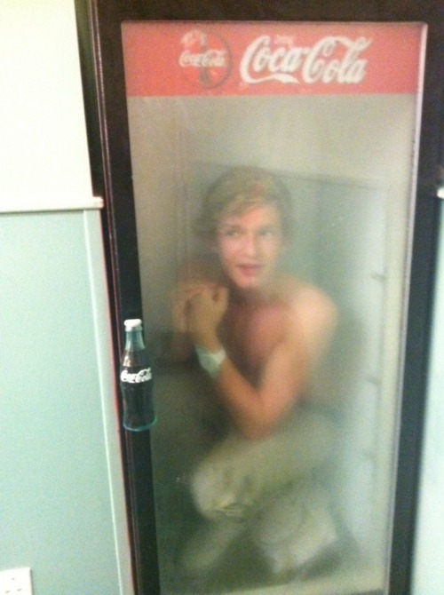 Cody Simpson shirtless in a CocaCola freezer