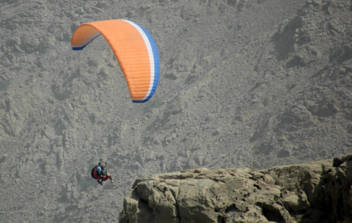 Arrive in style: paragliding into the Six Senses Zighy Bay