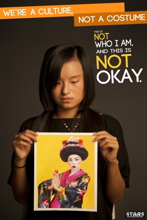 Young Asian woman holding a photo of someone dressed as a geisha, with the words "This is not who I am and this is not okay"