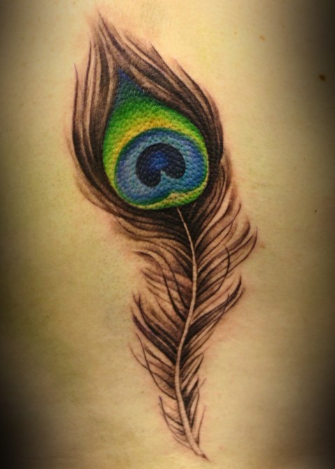 A peacock feather tattoo