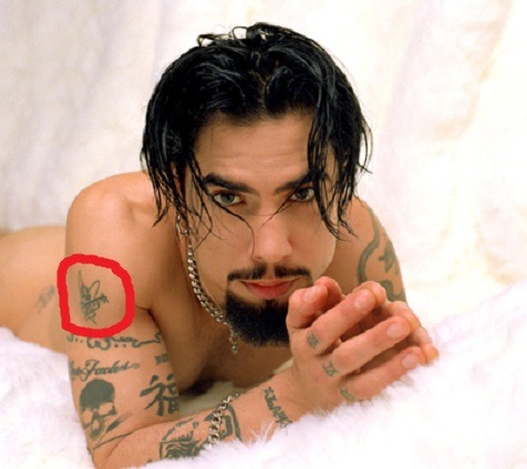 sad stories of musicians with tattoos relating to bands they were fired from