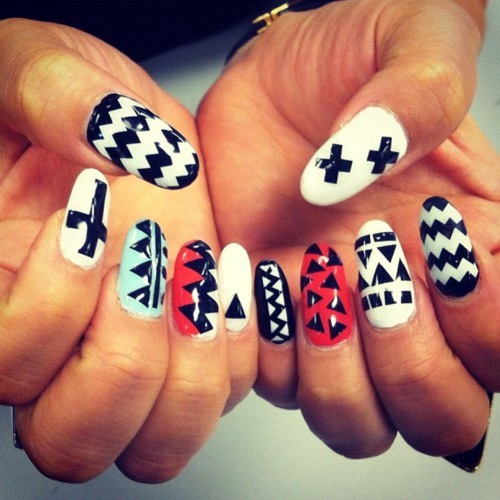 black adn white with a splash of color always a go nail art design
