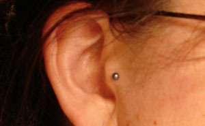 have a tragus piercing?)