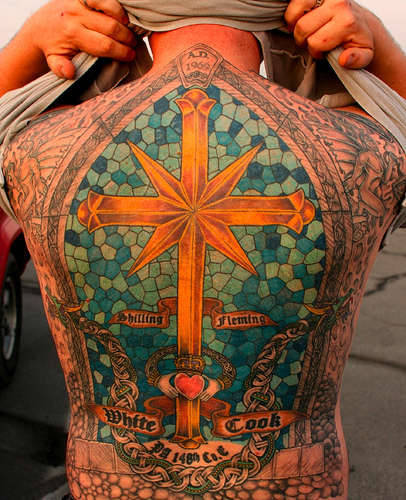  back of the rib cage Top 10 Highly Meaningful Tattoo Designs for Men 