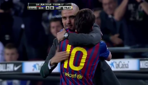 Messi embracing Pep Guardiola