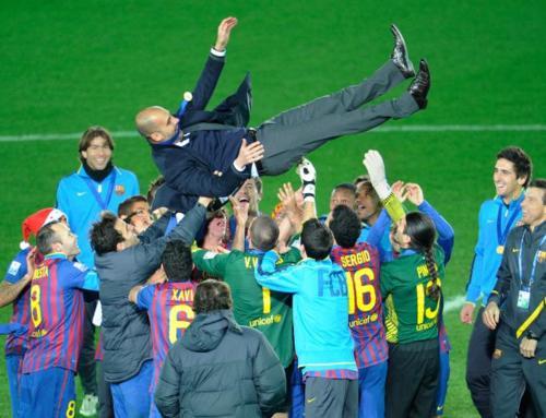 Pep Guardiola celebrating with players
