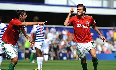 Michu celebrating after scoring for Swansea City