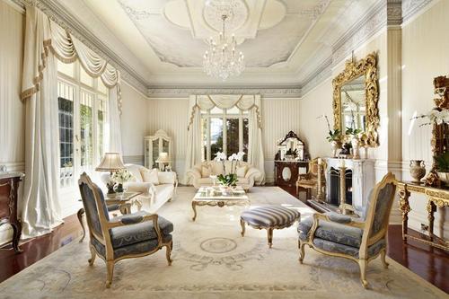 A Victorian era style, with baroque trim, however the use of white and cream is Edwardian era
