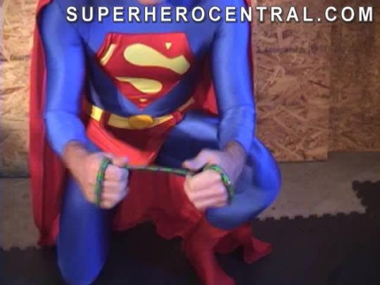 Superman in intense kryptonite torture .