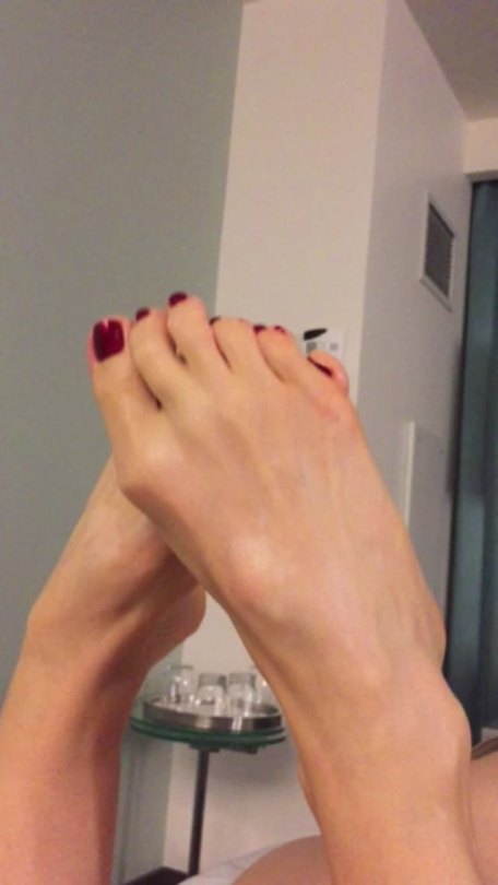 Teasing my husband at the hotel with my feet and my nice round