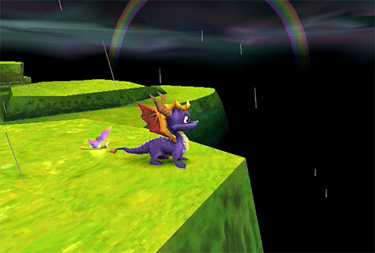 gif from spyro 2 of spyro and sparx idling under a rainbow in the rain in the hurricos stage.