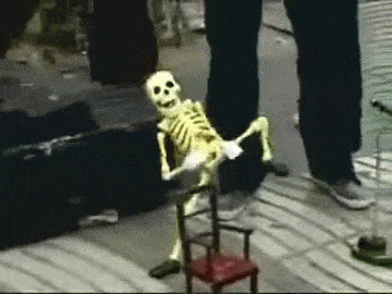 A skeleton marionette dancing