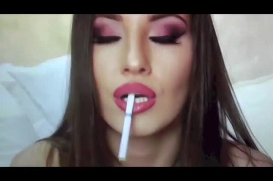 A video of sexy Mascha smoking a cigarette